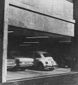 Photograph of cars parked under the Library