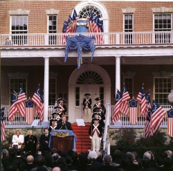 Color photograph of Bill Clinton on the steps of Old North