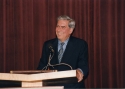 Mario Vargas Llosa, Distinguished Writer in Residence, School of Languages and Linguistics, stands behind a podium