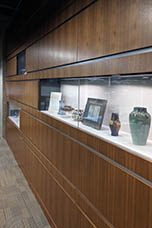 Exhibition cases showing pottery in the Paul F. Betz Reading Room