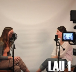 A screenshot from the Floors of Lau video, showing two students conducting an interview in the Production Studio with the text Lau 1