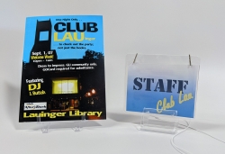 A flyer and staff badge from Club Lau 2009
