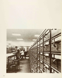 A page from the 1971 yearbook, showing a photo of a man using the library's card catalog