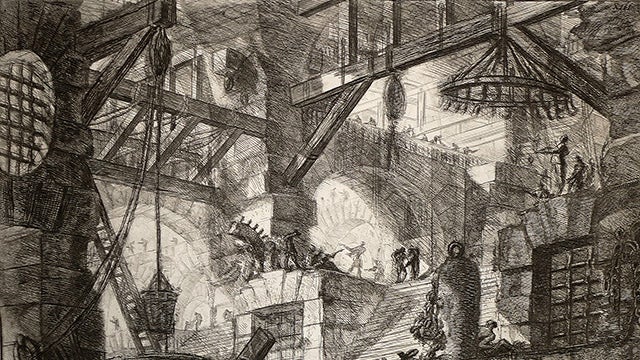 Detail from an etching entitled Carcere (Prison) by Giovanni Battista Piranesi, circa 1835, showing a cavernous shadowy room, looking upward at numerous stone archways, support beams, and large chandeliers, along with several doorways blocked off with prison bars. Human figures, sketched with minimal detail, toil on stairways and on top of archways, lifting baskets with pulleys.