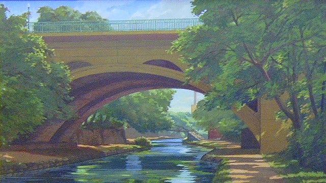 Detail from an oil painting by John Morrell from 1993, of the C & O Canal and towpath in Georgetown as it passes under an arch of the Key Bridge. A sunny day is depicted, as trees lush with leaves cast the towpath in shade and the sky is reflected off the water of the canal.